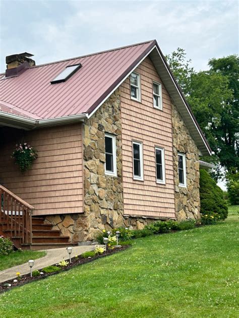 pic of white house w/ maroon metal roof|modern metal roof colors.